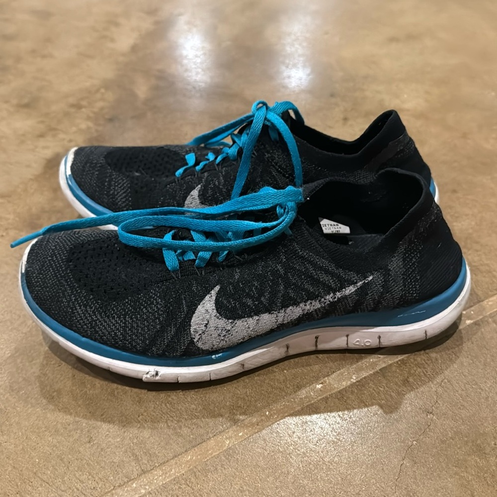 Blue and Black Nikes